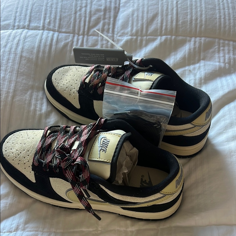 Nike Black and Cream Sneakers.